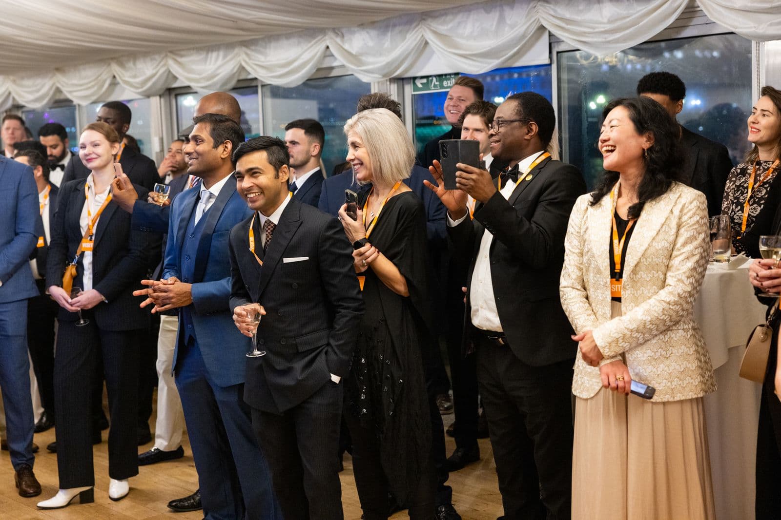 candid photo of group at cocktail event