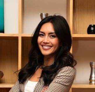 patricia standing with arms crossed